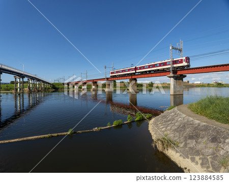 Kintetsu Myoji Line train crossing the Yamato River Kintetsu Myoji Line train crossing the Yamato River 123884585