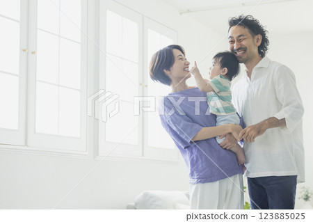 Family in the living room Family in the living room 123885025