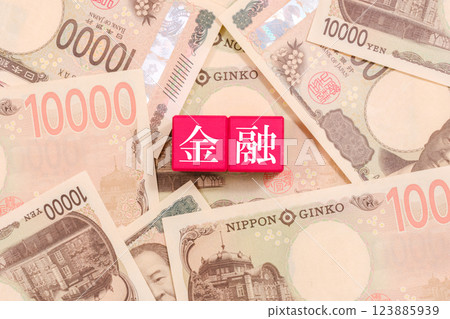 10,000 yen bill and finance and economy written on blocks 10,000 yen bill and finance and economy written on blocks 123885939