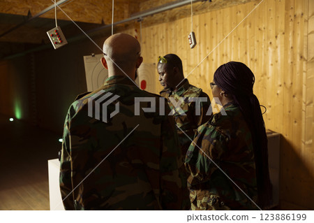 Team of military units at shooting range used to train and test soldiers on necessary combat skills. Army special operations forces preparing to start training, enhancing combat readiness 123886199