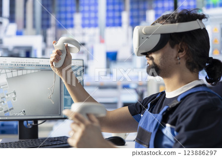 Photovoltaics factory specialist using VR equipment to do performance testing of solar panel designs. Man improving existing solar panel configurations for cost reduction using virtual reality tech 123886297