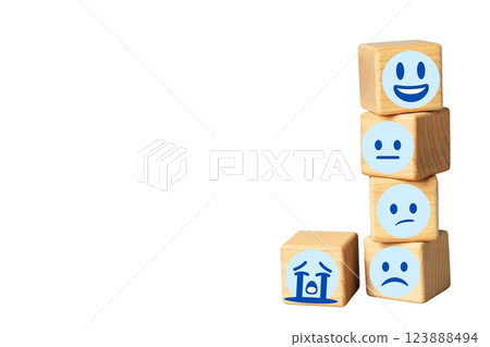Stress Month, Wooden cubes with emoji on white background, space for text 123888494