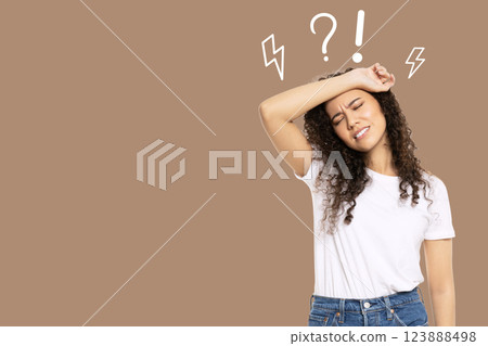 Stress month, tired woman on a brown background, space for text 123888498