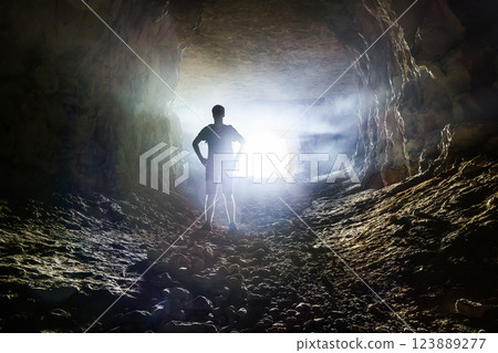 Man in cave Man in cave 123889277