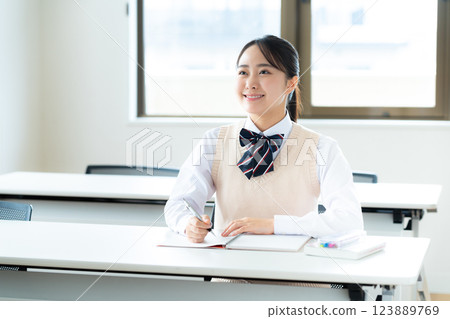 Students studying in classroom 123889769