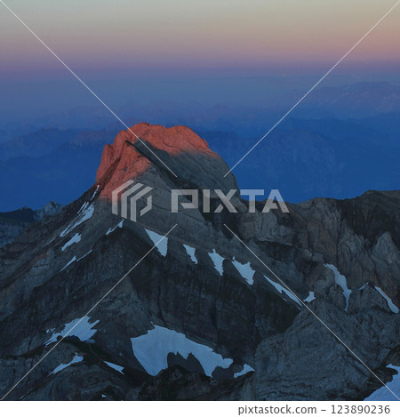 Peak of Mount Altmann at sunset. View from Mount Saentis, Switzerland. 123890236