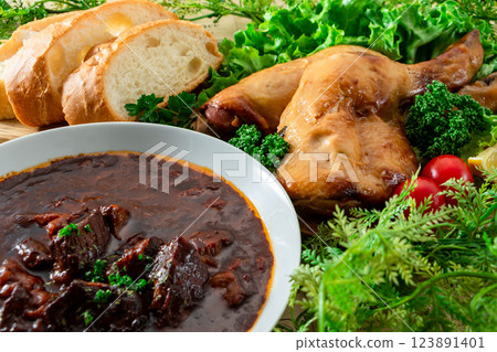 Beef stew and roast chicken 123891401