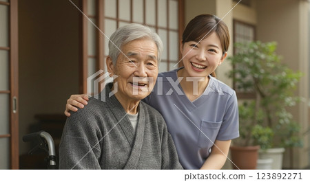Care staff and elderly people at the entrance 123892271