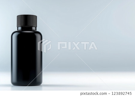 Minimalist Travel Sized Glass Fragrance Bottle with Matte Black Cap on White Background 123892745