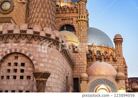 Exploring the intricate architecture of a historical building in Cairo during sunset 123894056