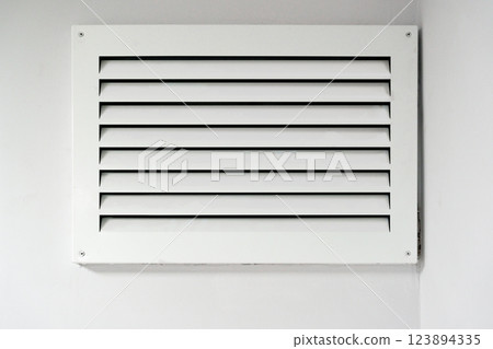 Ventilation system installation in a modern interior space enhancing air circulation and comfort Ventilation system installation in a modern interior space enhancing air circulation and comfort 123894335