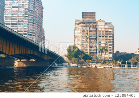 Cityscape view of Cairo with a bridge crossing the Nile River under the sunlight 123894405
