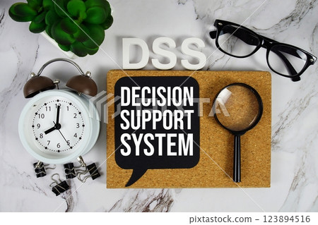 DSS - Decision Support System acronym with alarm clock and magnifying glass, business concept background 123894516