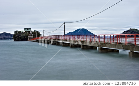 The main hall of Tsushima Shrine floating in the Seto Inland Sea The main hall of Tsushima Shrine floating in the Seto Inland Sea 123894730