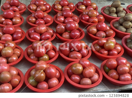 Tomatoes in a Red Basket at Bujeon Market 123894828
