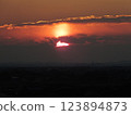 Sunset sun hidden in the clouds 123894873