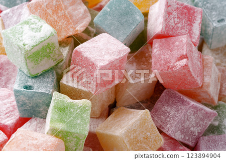 Colorful assortment of Turkish delight displayed in vibrant hues ready to be enjoyed at local confectionery shop Colorful assortment of Turkish delight displayed in vibrant hues ready to be enjoyed at local confectionery shop 123894904