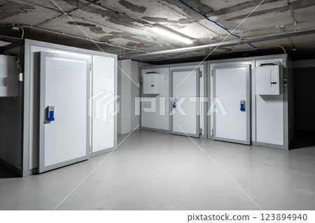 Secure storage units in a well-lit basement facility for personal and business use 123894940
