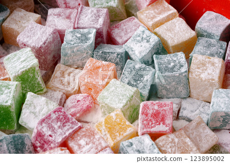 Colorful Turkish delight squares displayed together in a vibrant arrangement at a market stall 123895002