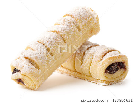 Delicious traditional rolled pastries filled with chocolate and dusted with powdered sugar Delicious traditional rolled pastries filled with chocolate and dusted with powdered sugar 123895631