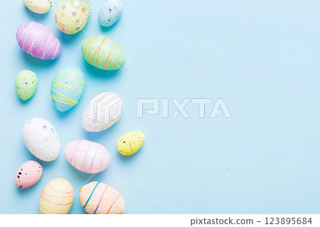 decorative easter eggs on colored background. easter eggs collection top view with copy space decorative easter eggs on colored background. easter eggs collection top view with copy space 123895684