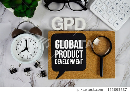 GPD - Global Product Development acronym with calculator, alarm clock and magnifying glass, Business and Financial concept background GPD - Global Product Development acronym with calculator, alarm clock and magnifying glass, Business and Financial concept background 123895887