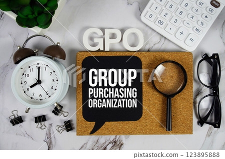 GPO - Group Purchasing Organization acronym with calculator, alarm clock and magnifying glass, Business and Financial concept background GPO - Group Purchasing Organization acronym with calculator, alarm clock and magnifying glass, Business and Financial concept background 123895888
