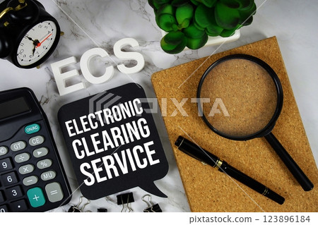 ECS - Electronic Clearing Service acronym with calculator, alarm clock and magnifying glass, business concept background 123896184
