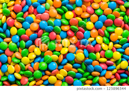 colorful candies as background top view. Seamless pattern with candy. Many sweet candies close-up colorful candies as background top view. Seamless pattern with candy. Many sweet candies close-up 123896344