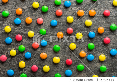 colorful candies as background top view. Seamless pattern with candy. Many sweet candies close-up colorful candies as background top view. Seamless pattern with candy. Many sweet candies close-up 123896345