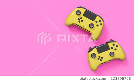 Realistic yellow video game joysticks or gamepads on pink background. 3D rendering of streaming gear for cloud gaming and gamer workspace concept 123896798