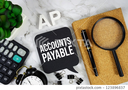 AP - Accounts Payable acronym with calculator, alarm clock and magnifying glass, business concept background 123896837