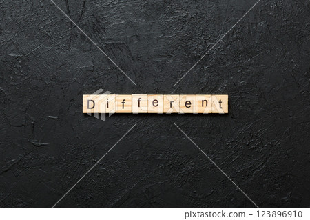 different word written on wood block. different text on table, concept. different word written on wood block. different text on table, concept. 123896910