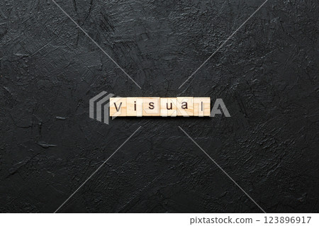 visual word written on wood block. visual text on table, concept visual word written on wood block. visual text on table, concept 123896917