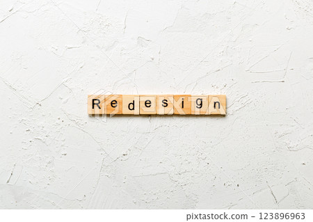 REDESIGN word made with wooden blocks concept REDESIGN word made with wooden blocks concept 123896963