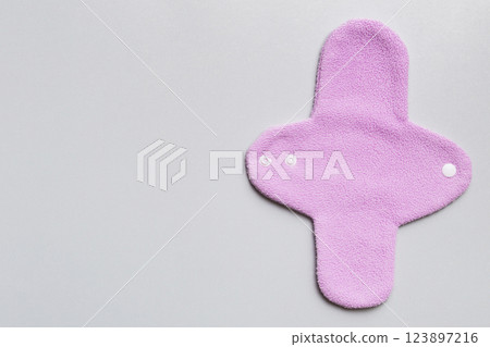 Eco-friendly reusable fabric women's pads. set of colorful bright reusable menstrual pads. zero waste woman periods concept top view with copy space 123897216