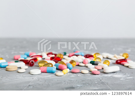 Collection Of Various Medical Tablets And Pills. Assorted pharmaceutical medicine pills, tablets and capsules on table background. Heap of assorted various medicine tablets. Health care Collection Of Various Medical Tablets And Pills. Assorted pharmaceutical medicine pills, tablets and capsules on table background. Heap of assorted various medicine tablets. Health care 123897614
