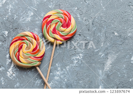 Set of colorful lollipops on colored background. Summer concept. Party Happy Birthday or Minimalist Concept 123897674
