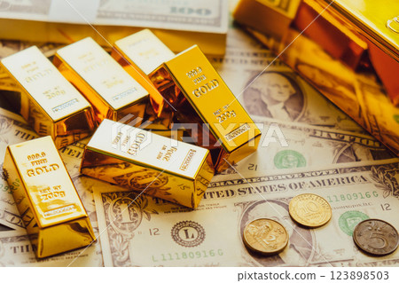 Gold bars and dollar banknotes. Business and finance investment concept. 123898503