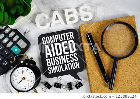CABS - Computer Aided Business Simulation acronym with calculator, alarm clock and magnifying glass, business concept background 123899124