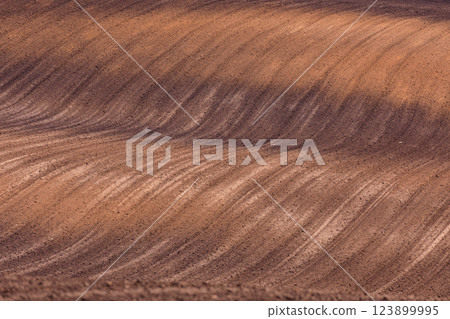 Abira Town, Hokkaido: Field ridges spreading across the hills [May] 123899995