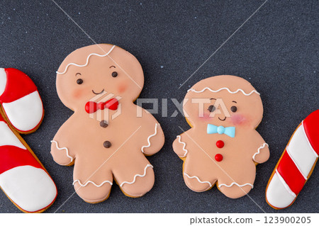 Gingerbread decorated with white sugar glaze. Food background. Christmas cookies. Gingerbread decorated with white sugar glaze. Food background. Christmas cookies. 123900205