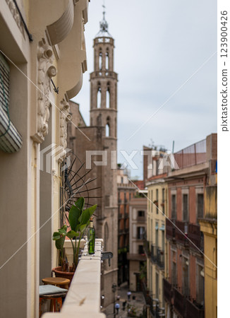 Urban European city view from a narrow balcony with decorative elements and classic architecture 123900426