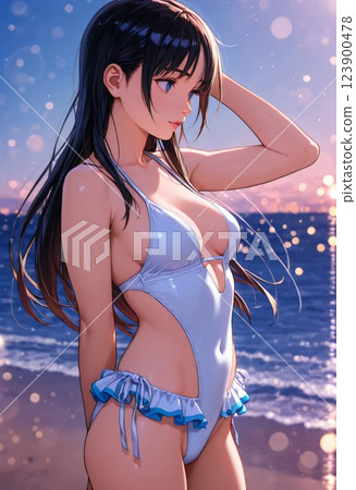 穿著泳衣的年輕女子站在海邊的沙灘上 123900478