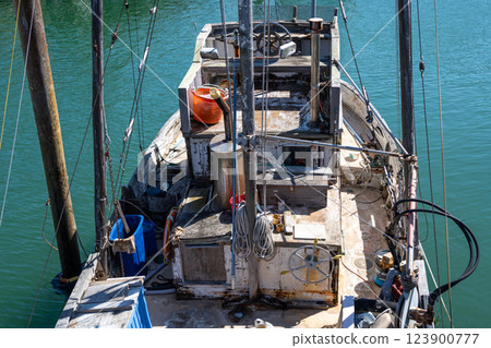 Old fishing boat docked at Fisherman Wharf in San Francisco, USA 123900777