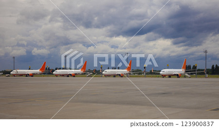 Airport with a lot of aircraft. Airplane on the platform International Airport. Runway. Planes Airport with a lot of aircraft. Airplane on the platform International Airport. Runway. Planes 123900837