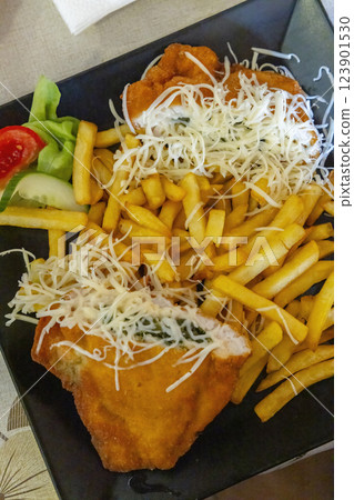 cordon bleu with french fries cordon bleu with french fries 123901530