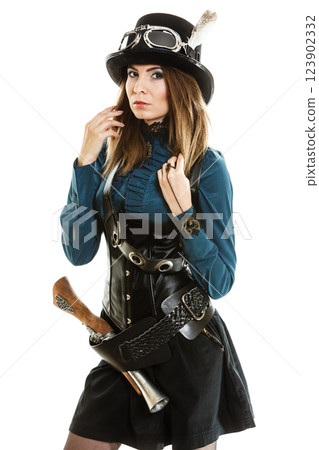 steampunk woman with gun studio shot. steampunk woman with gun studio shot. 123902332