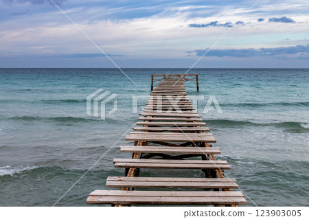 Wooden pier on Muro Beach, Playa de Muro, Majorca, Mallorca, Bal Wooden pier on Muro Beach, Playa de Muro, Majorca, Mallorca, Bal 123903005