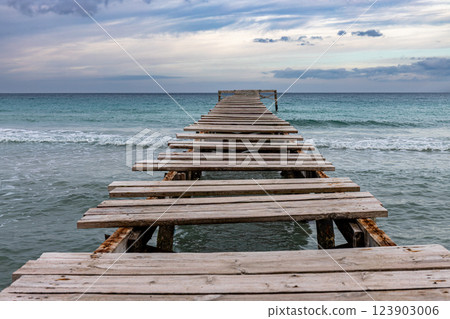 Wooden pier on Muro Beach, Playa de Muro, Majorca, Mallorca, Balearic Islands, Spain, Europe Wooden pier on Muro Beach, Playa de Muro, Majorca, Mallorca, Balearic Islands, Spain, Europe 123903006